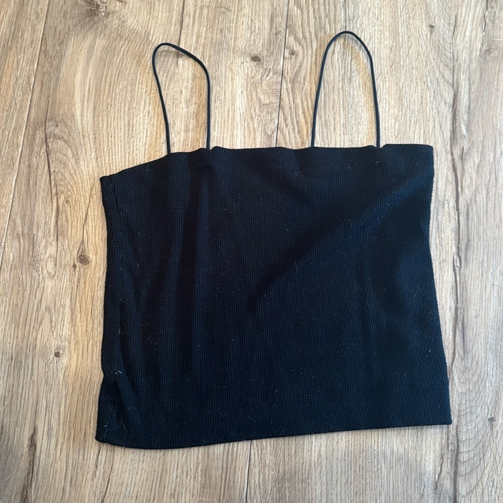 I’m selling a basic black spaghetti strap tanktop.